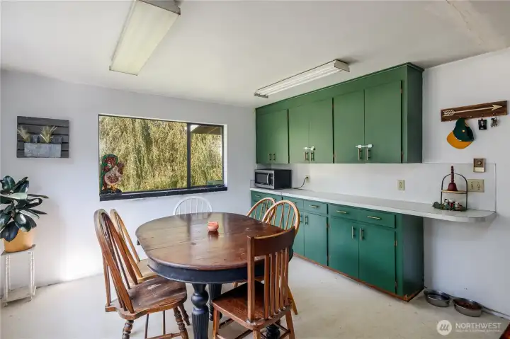 Bright dining area off kitchen with more cabinetry and counter space
