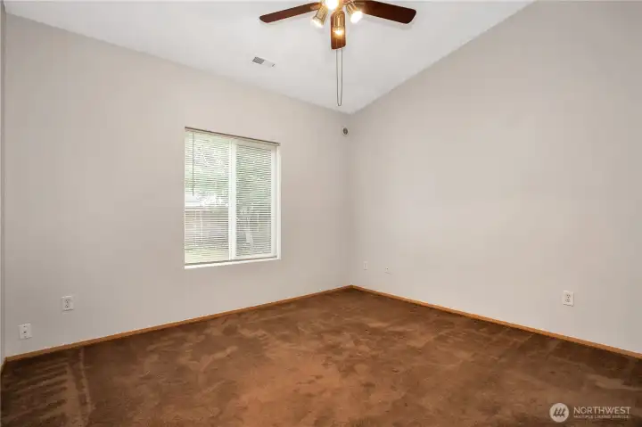 Walking into the primary bedroom