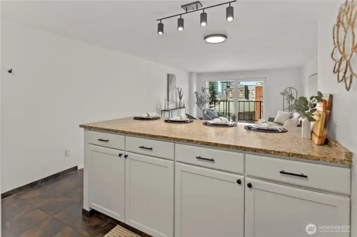 Granite counters and plenty of space to host guests.