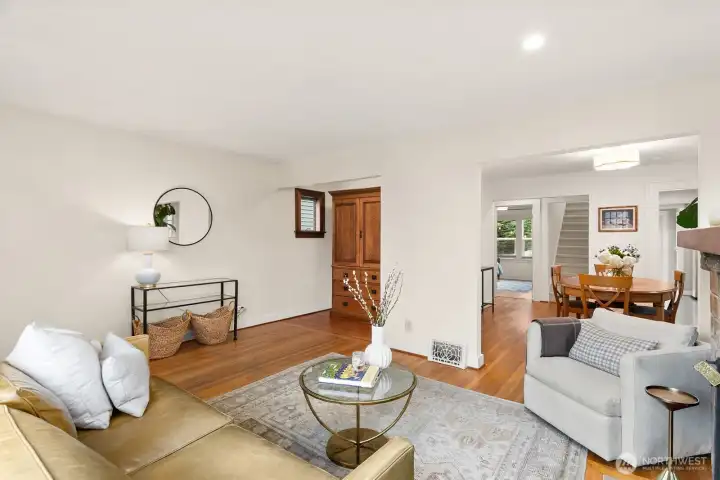 Living room opens to generous formal dining room. Double-paned windows offer great protection from the elements.