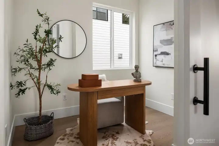 Office off kitchen on main level.