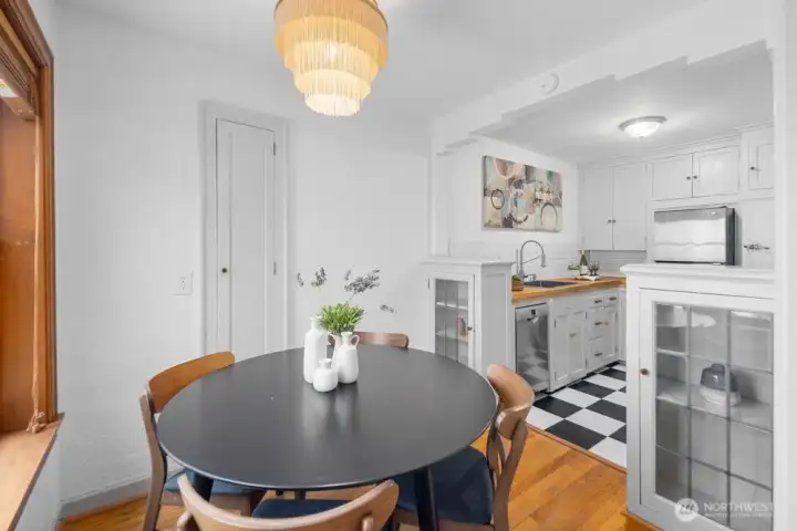 dining room space with a fun light fixture