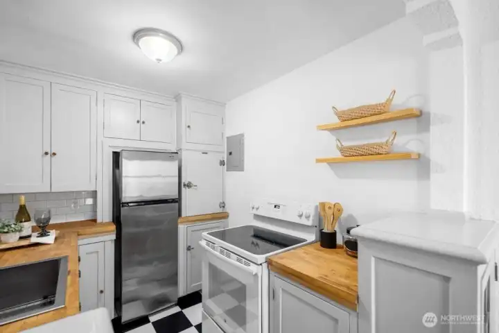 plenty of storage in this kitchen with some original touches