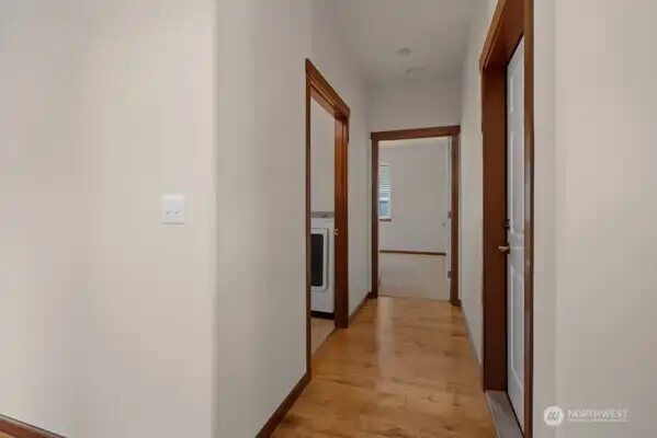 Hallway to bedroom 2, laundry and garage
