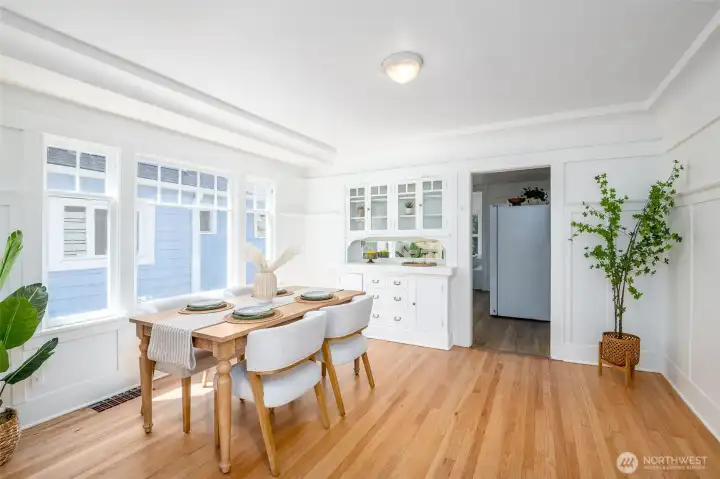 Lots of big windows to let in the light in this dining room. Lots of big windows to let in the light in this dining room.