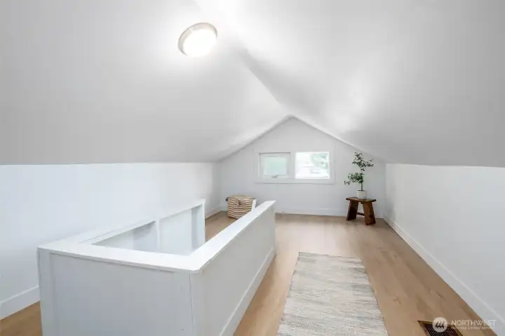 This landing area that's ideal for a home office, reading nook, or creative space. This landing area that's ideal for a home office, reading nook, or creative space.