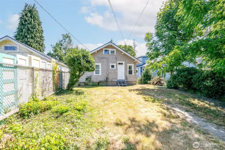 It is fun to imagine how to use this space... a cool patio would be a great addition with easy access from the kitchen. It is fun to imagine how to use this space... a cool patio would be a great addition with easy access from the kitchen.