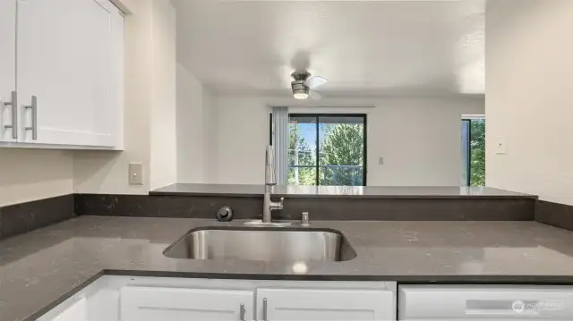 The kitchen sink conveniently located, overlooking the dining room; another plus for entertaining.