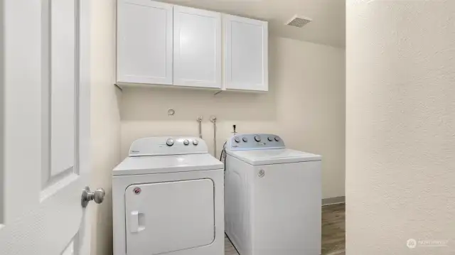 Large utility room with storage & appliances stay!