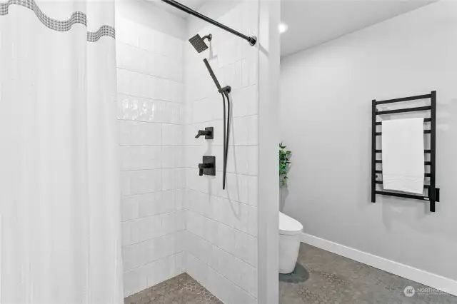 Primary bathroom with 0-entry (curbless) shower.