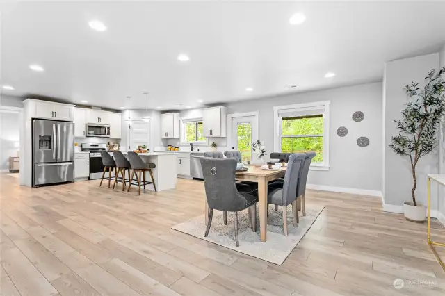 Kitchen open to the living space and dining room.