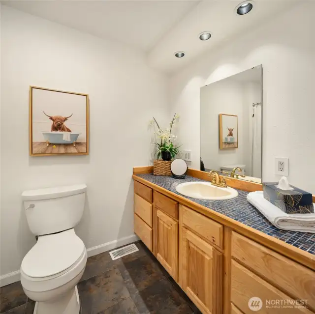 Hall bathroom with tub/shower and charming barn door!