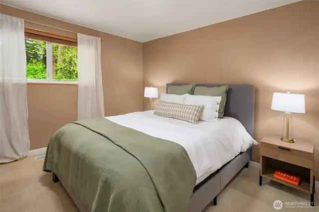 Primary suite with room for king size bed. queen shown.