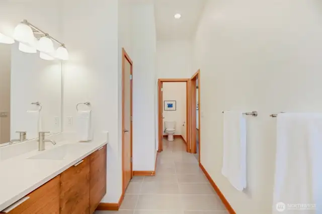 Private water closet & 9 ft high ceilings. Timeless style and luxury features creates the feeling of a spa.