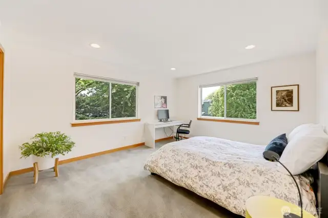 Oversized 2nd bedroom with serene treed views.
