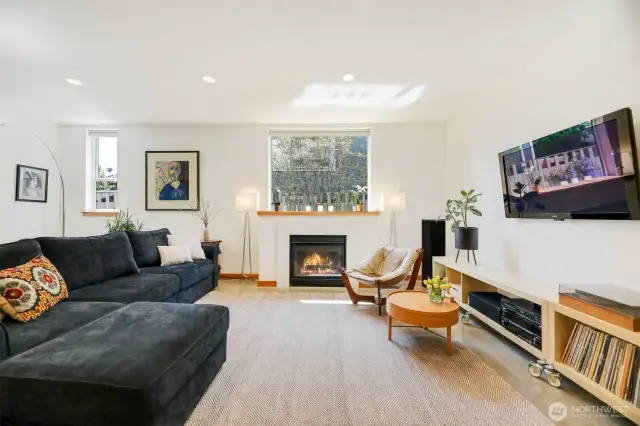 Cozy gas fireplace & tons of natural light.