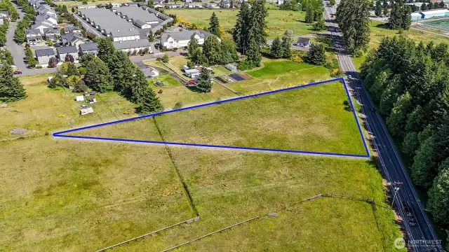 Located outside the city limits but with all amenities still at your fingertips. Blue boundary lines are approximate. Buyer to verify to their own satisfaction.