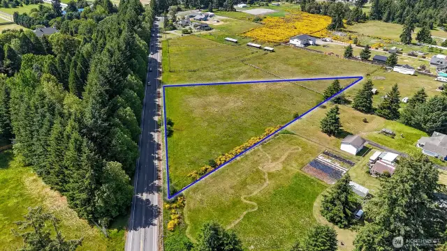 Sitting on the main road leading into Yelm. Blue boundary lines are approximate. Buyer to verify to their own satisfaction.