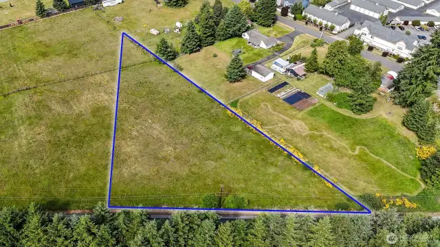 Level and dry. Partially fenced. Blue boundary lines are approximate. Buyer to verify to their own satisfaction.