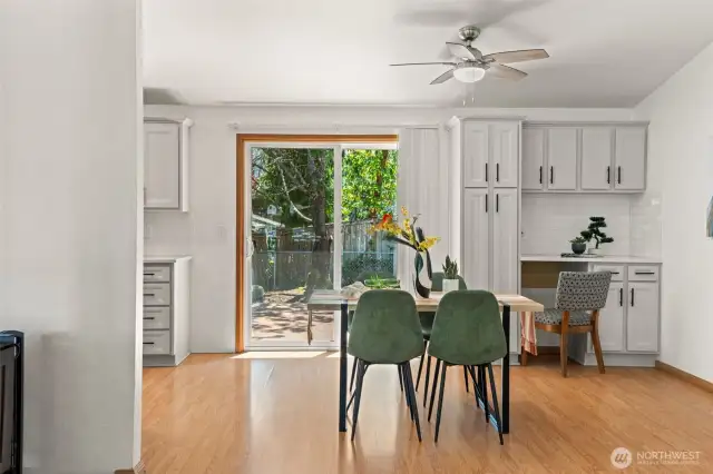 Dining room with custom coffee bar and cabinet space