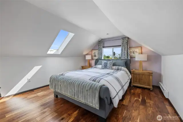 primary bedroom upstairs with peek-a-boo view