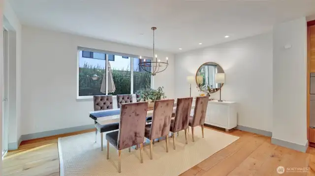 Separate dining area provides the perfect setting for family celebrations and lively dinner parties.