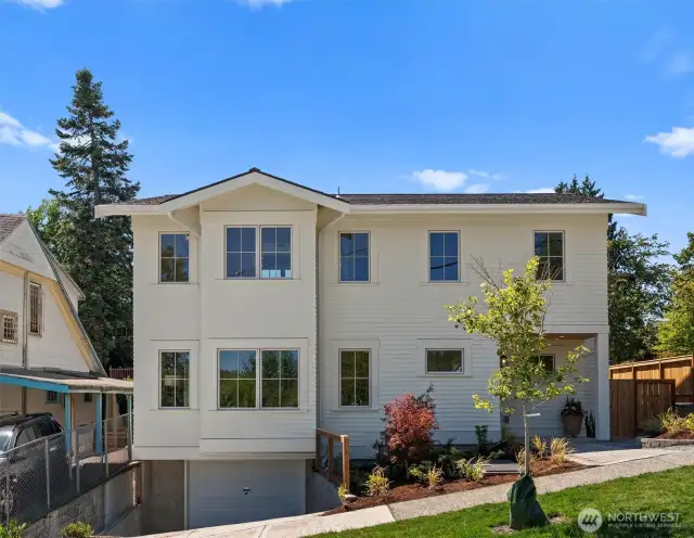 Beyond the box urban oasis! Stand out from the crowd with this truly unique Genesee home. Built by local builder/designer team who care deeply about Seattle’s charm, it offers uncompromising craftsmanship & thoughtful design – far from any cookie-cutter box. With all millwork framed in solid Douglas fir instead of particle board or MDF + wood-cased windows, it’s built to last for generations. This investment means lasting quality, comfort, and beauty. Features include a main floor en suite bedroom, ducted heat pump with A/C, heated primary bath floor, eco-friendly Marmoleum, ready-to-wire EV conduit & an open, light-filled floor plan with an entertainment style kitchen. Just a 9 min. WALK to Light Rail, PCC, Columbia City shops, cafes & parks!... 84 WALK SCORE!