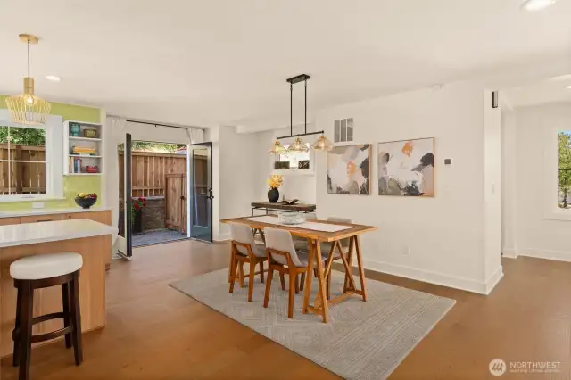 With a nod to communal meals but dispensing with what become unused formal dining room areas, this set up is ideal for both casual and formal affairs....