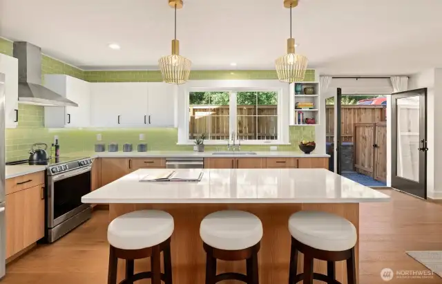 But with functionality and socialization in mind. Eco friendly with induction range and cooktop. Bosch stainless steel appliances and useful counter and storage spaces abound. Generous pantry for all your supplies....