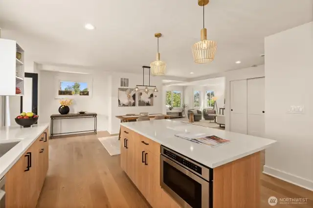 Modern motorized pull-out microwave makes getting dishes in and out with ease....