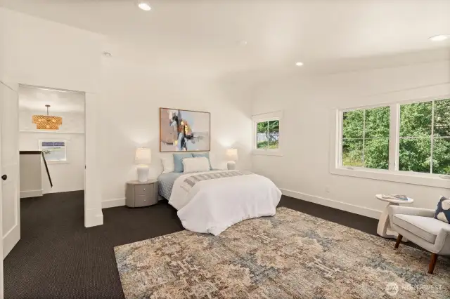 Generously designed space offers an option to furnish it with a reading area for private space. Large walk-in closet area rounds out the primary suite....