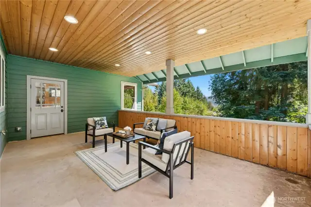 Main floor covered patio accessed from kitchen and living room (stubed for gas BBQ line)