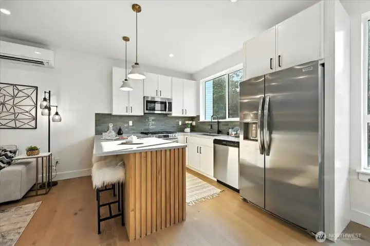 Gourmet Kitchen with quartz counters and stainless appliances