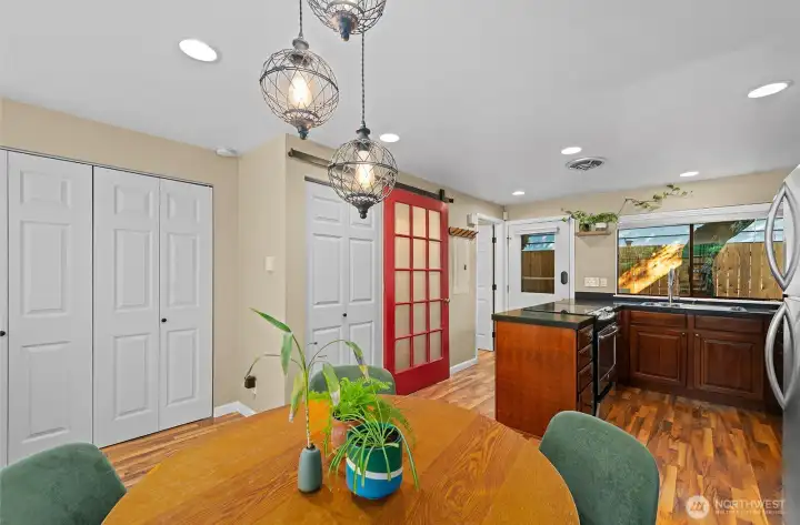 Coat closet and utility closet of off dining area.