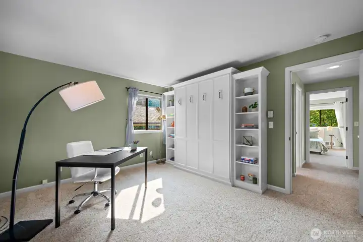 Second bedroom has built murphy bed. Perfect for guests, and for a home office.