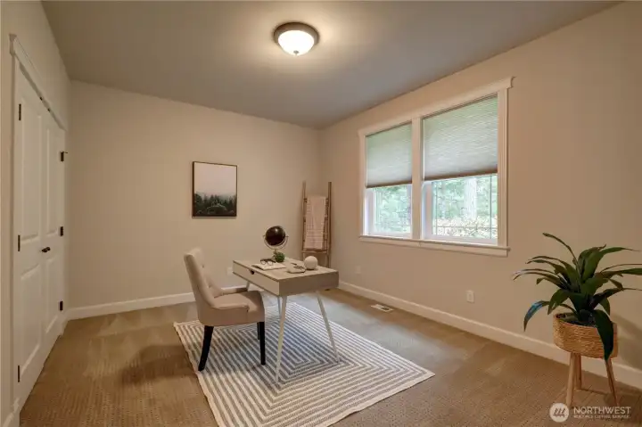 The versatile Bedroom 3 off the foyer can also serve as an office or formal dining room.