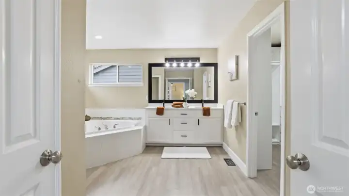 Unwind and relax in this serene primary ensuite.