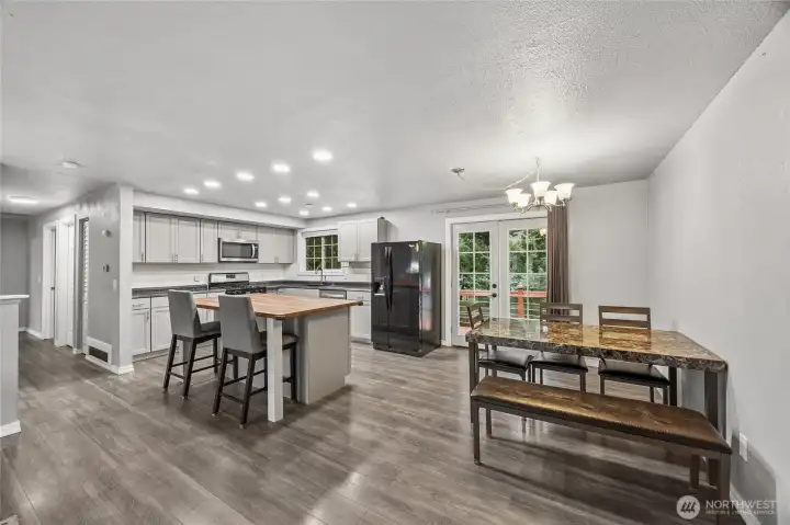 Kitchen opens seamlessly to the dining area, creating an easy flow for everyday meals and gatherings.