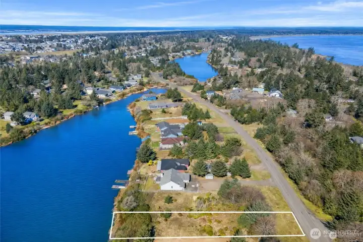 Lakefront! Minutes to town and all utilities ready in the street! Property lines are approximations - buyer to do due diligence.