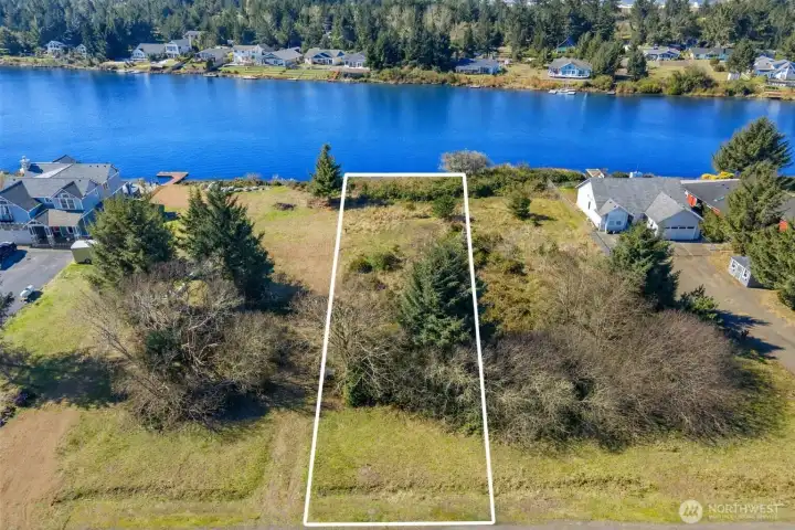 Lakefront! Minutes to town and all utilities ready in the street! Property lines are approximations - buyer to do due diligence.