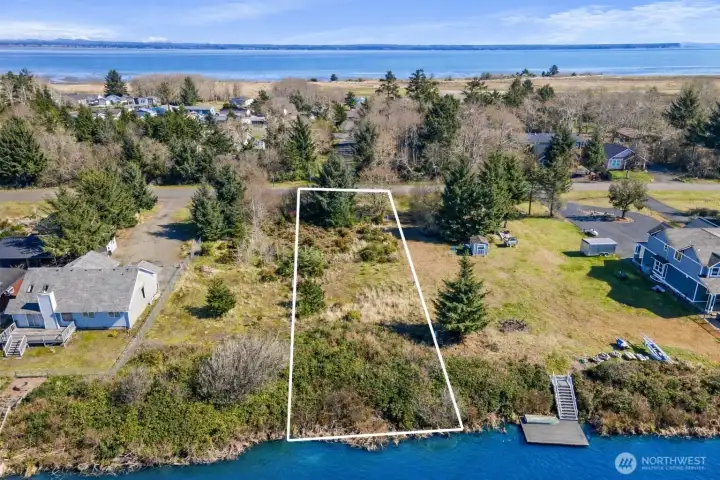 Lakefront! Minutes to town and all utilities ready in the street! Property lines are approximations - buyer to do due diligence.