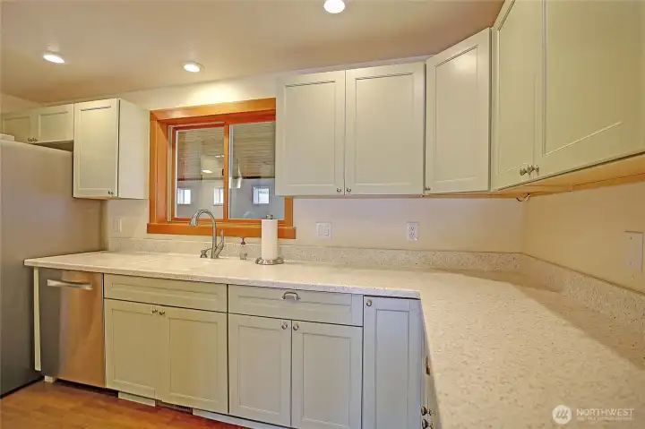 Slab tops, Custom Trim and Updated Appliances~