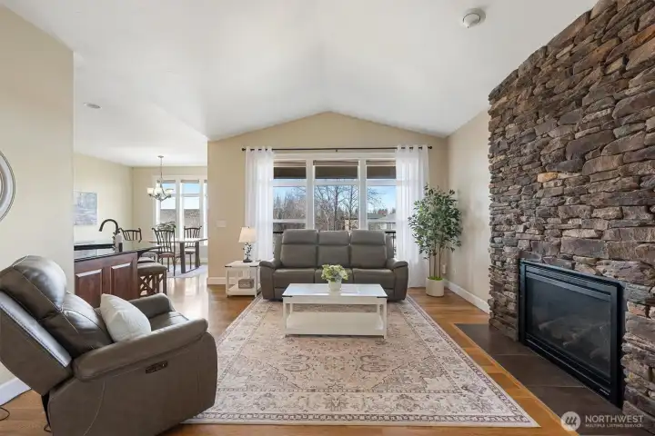 Solid wood floors and gas fireplace