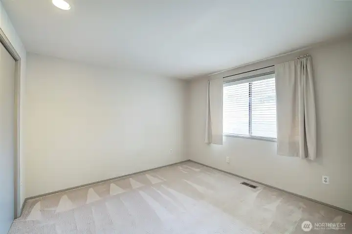 Large 2nd floor bedroom with plenty of closet space.