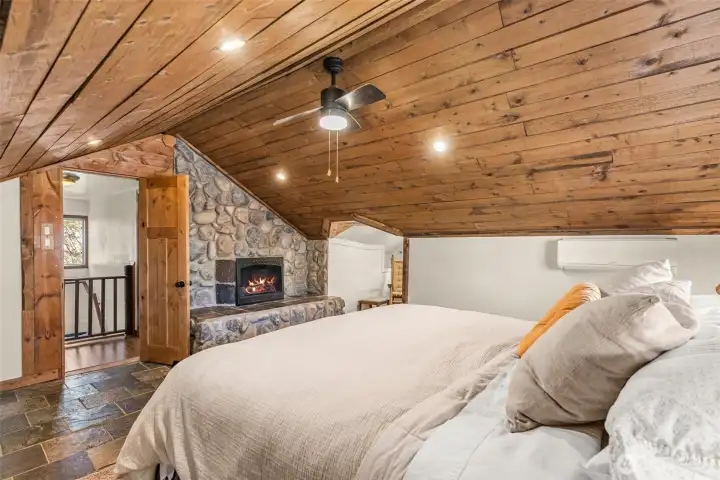 Private upper level bedroom w/ electric fireplace