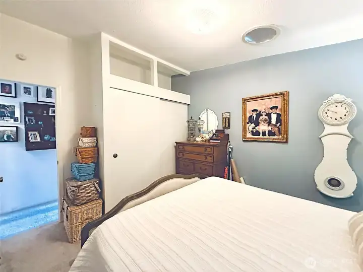 Third Bedroom, carpet, wall closet with bonus storage above view from inside the room