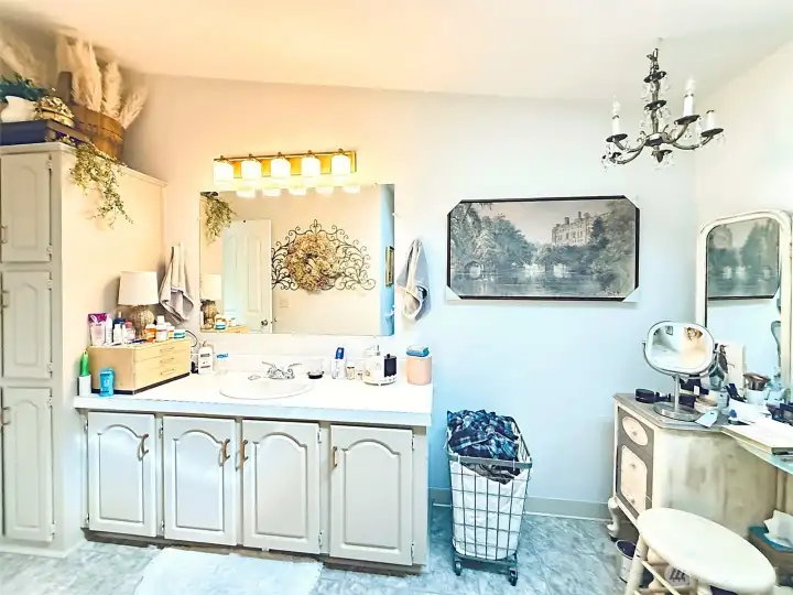 Primary bathroom, over-sized with hookups for washer/dry providing optional placement
