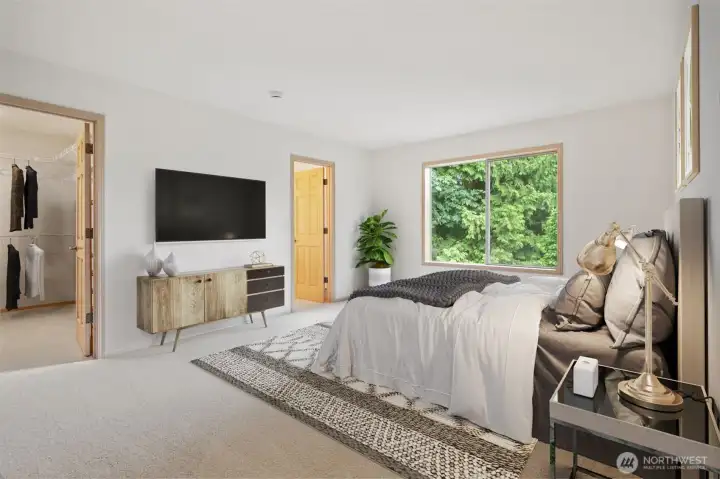 Primary Bedroom with Double French Door Entry, Generous walk in closet and full en-suite bathroom with double sink vanity, separate toilet, deep soaking tub and separate stall shower. Fresh carpets and vinyl flooring too. Virtually staged to show you the size and potential!