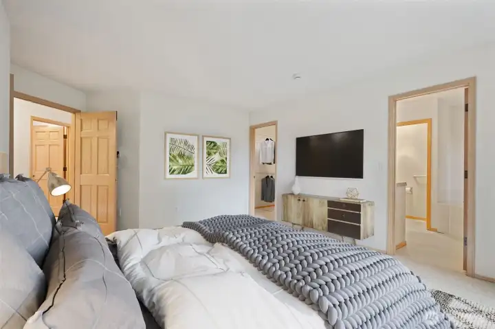 Primary Bedroom with Double French Door Entry, Generous walk in closet and full en-suite bathroom with double sink vanity, separate toilet, deep soaking tub and separate stall shower. Fresh carpets and vinyl flooring too. Virtually staged to show you the size and potential!