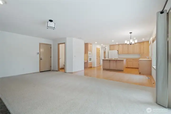 Family room with fresh carpets - shown here without virtual staging